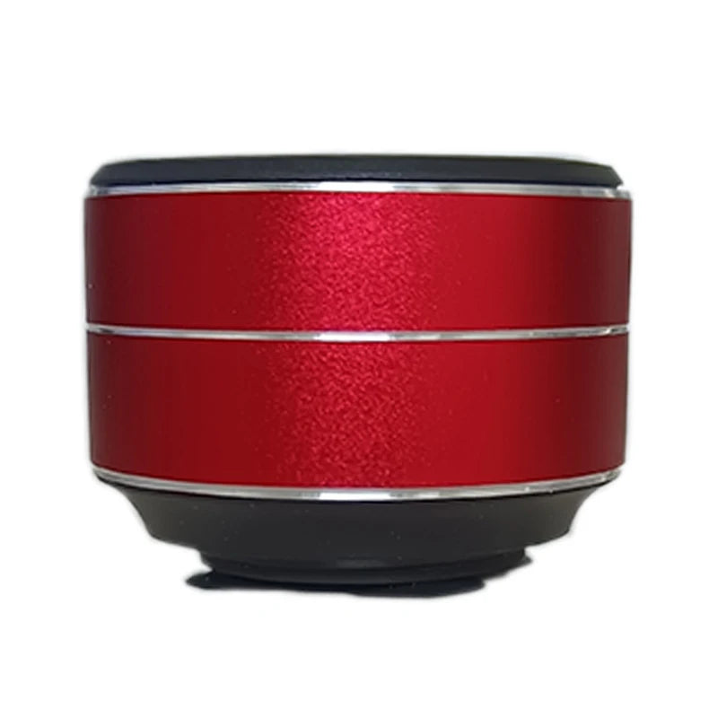 Red and black cylindrical speaker on a white background