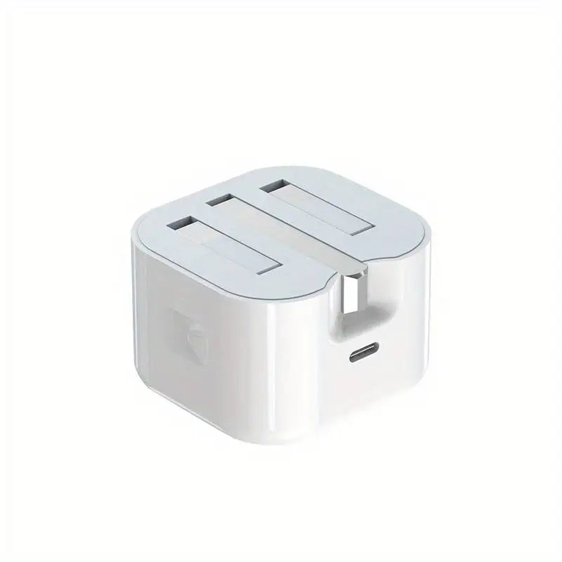 White travel adapter with multiple ports on a white background
