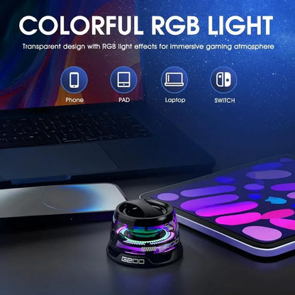 Colorful RGB light device with laptop and phone on a dark background