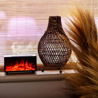 Woven decorative vase and small electric fireplace on a windowsill with natural light filtering through blinds.