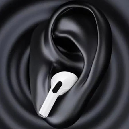 White wireless earbud in a black ear against a black background