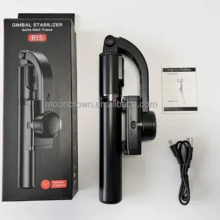 Gimbal stabilizer with packaging and accessories on a white background